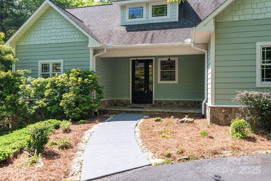 A must-visit mountain retreat nestled within the picturesque High Meadows Golf & Country Club in Roaring Gap. Immerse yourself in a tranquil oasis, where the presence of numerous hummingbirds adds to its charm. Upon entering, you will be greeted by an inviting and spacious floor plan that features hardwood floors, vaulted ceilings, and a cozy stone fireplace. Adjacent to the main living area is your primary suite, which boasts of ample space with a large walk-in closet, dual vanities, a shower, & a jacuzzi tub. The primary bedroom & great room are connected by double sliding doors that lead you outside onto your partially covered deck. The lower level of the house includes a family room for gatherings, two bedrooms, and a full bathroom. A spacious driveway, encompassing a circular drive, provides ample space for accommodating additional guests. Great amenities here @ High Meadows Country Club.