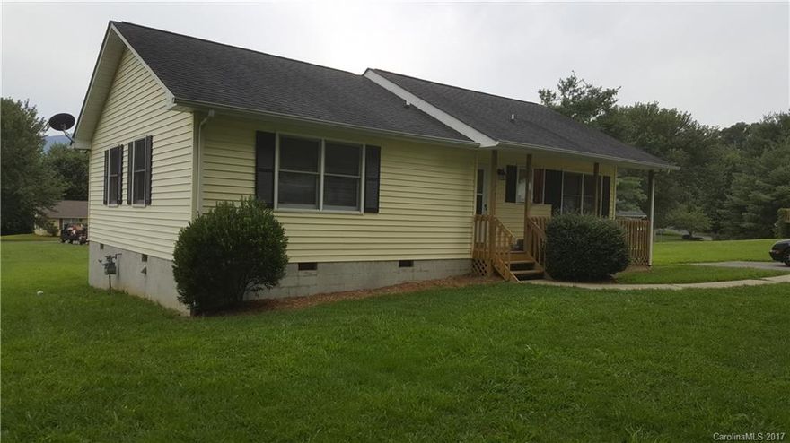 Cosy 2 bedroom 2 bath in Black Mountain area.  New Pergo flooring through out and new vinyl flooring  will be  installed in the kitchen and bathrooms.  Interior freshly painted.   Covered rocking chair front porch and  deck  off of  living room.