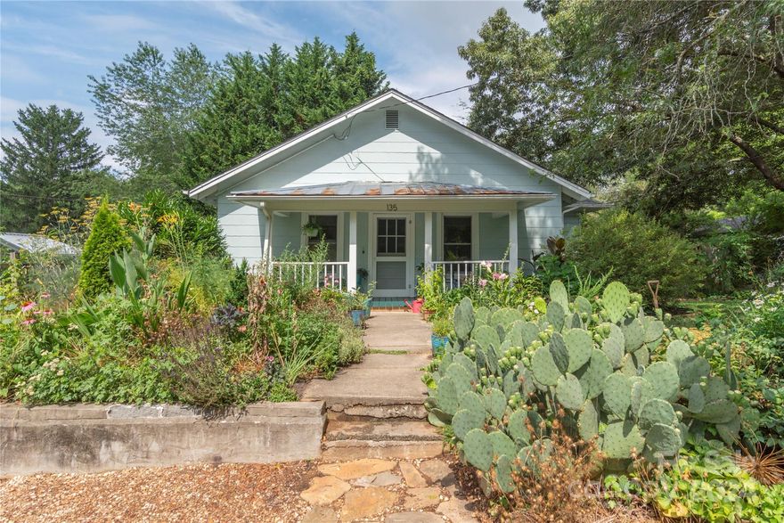 A stone's throw to the heart of West Asheville's vibrant shopping, dining and cafes, this updated 1926 bungalow features spacious one level living with a completely new 1BR/1BA basement apartment. Delightful blend of historic charm and expertly designed renovations for modern living. Gleaming hardwood floors throughout the main level and a smart, flowing floor plan. Bright Dining area connects to the cheerful kitchen with gas range. Enjoy the lovely greenery and landscaping on the "just right" sized corner lot from the abundant windows as well as the great outdoor living spaces in front and back. Clean, bright storage space in the unfinished portion of the basement. Don't miss this perfect opportunity for West Asheville living!