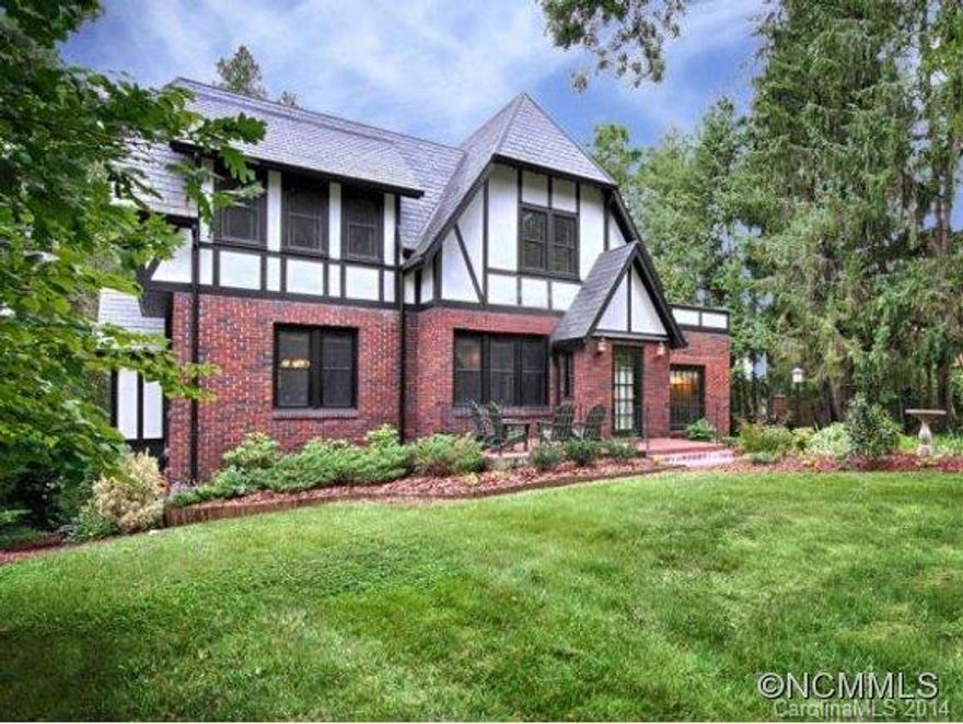 OPEN SUNDAY, 10/19, 2-4 PM!!  1927 Elegance with HUGE, flat, private back yard.  This stately Tudor boasts all original charm but offers extensive upgrades, including custom kitchen, new 100-year-old slate roof, complete exterior renovation, new windows, and more.  Quarter-sawn oak hardwoods throughout, new carpet in basement, wonderful views from sunroom.  Don't miss this perfectly situated, tasteful home on quiet street close to Beaver Lake!