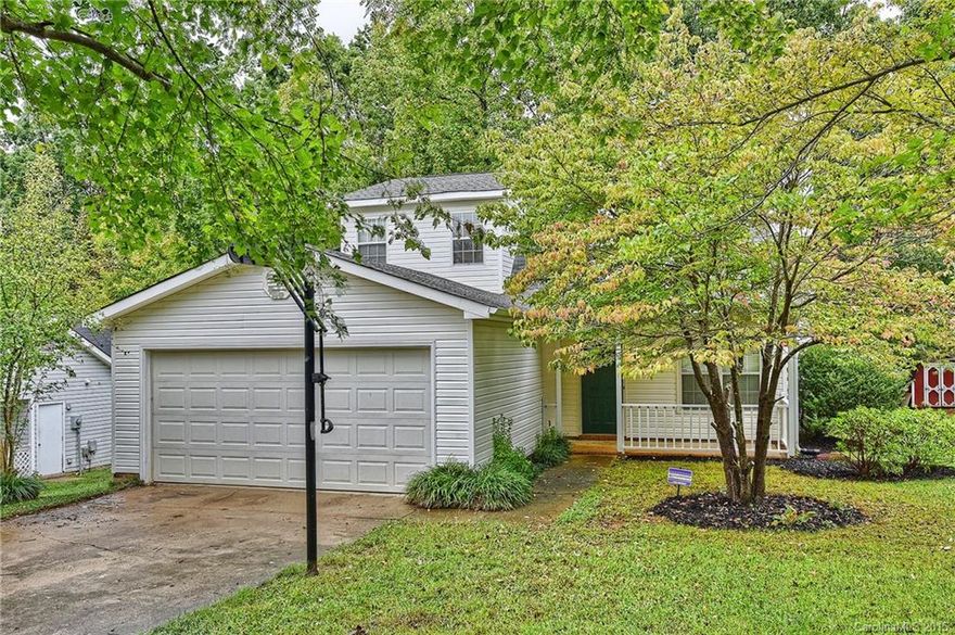 Beautiful 3 bedroom with master on main located on wooded lot! Features include 3 bedrooms plus a loft, master and laundry on main, Pergo laminate flooring in great room, breakfast and kitchen, wooded back yard and front porch. Convenient location 10 minutes to Whitewater Center and 15 minutes to Uptown Charlotte.