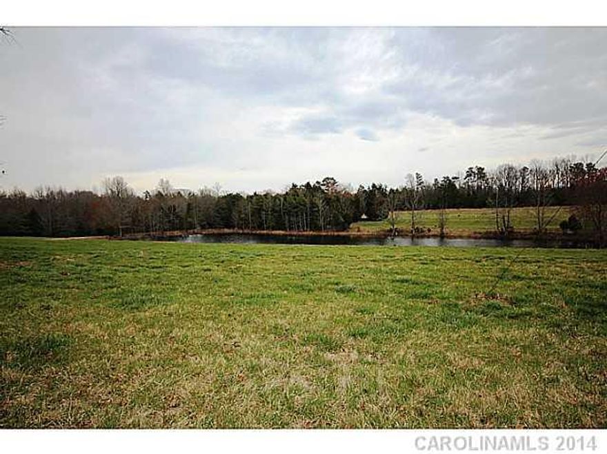 This beautiful 10 acre site contains a pond and is open. This was part of a 130 acre farm that was handed down from generation to generation.  Your chance to own a piece of history. Located only 6 miles from Lake Wylie shopping. No HOA. No HOA fees. Horses welcome.  Build when you want with who you want or choose one of our builders.  Great Clover Schools.