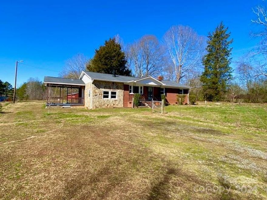 Amazing 2.48 Acres with endless possibilities! Massive 1560 sq. ft. shop with power and water on concrete slab. Charming 3 bedroom brick with room to expand. Easy to show.
