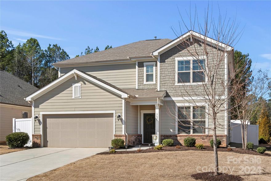 Awesome opportunity to call this 3 bedroom 2 1/2 bath home in the highly desirable Indian Land area your own! The Chatham is an open floor plan home featuring a beautiful kitchen with granite, SS,double oven, lovely cabinetry, plenty of work space, breakfast island plus large walk-in pantry. Dedicated dining area adjoins great room with fireplace, plenty of natural light, plus an office/flex space with French doors. Primary suite up features a tray ceiling, glass walk-in shower, beautiful dual vanity and huge walk-in closet. Two more bedrooms up with full bath plus a great loft space and a laundry room! Large back yard features privacy fencing, an expansive patio perfect for entertaining plus a deluxe kids play set and room to roam! Lot backs up to beautiful green space. Two car garage. Neutral paint, ceiling fans thru out. Excellent location convenient to shopping, dining, and entertainment, and just under ten miles to Ballantyne, near 485. This is the one you have been searching for!