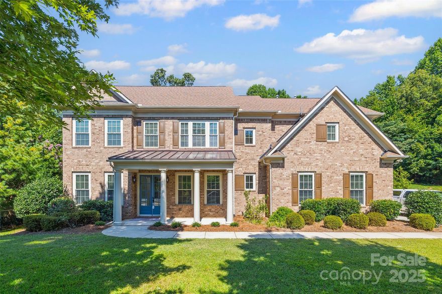 Back on the market with fresh updates! Nestled on a quiet cul-de-sac in the desirable Bridgemill community, this 3-story full-brick John Weiland home offers the perfect blend of timeless design and thoughtful improvements. The kitchen and downstairs bathroom have been refreshed to enhance style and function. The open floor plan features abundant natural light and site-finished hardwoods throughout the main level. A gas-log fireplace and custom built-ins anchor the great room, while the kitchen includes stainless steel appliances, a large island, and updated finishes. The main floor guest suite adds flexibility. Upstairs, the spacious primary suite includes his-and-her closets, double vanities, a garden tub, and a separate tile shower. Three additional bedrooms, two full baths, laundry, and a bonus room complete the second level. The third floor offers a versatile bonus room with full bath. 3-car garage, paver patio, and private backyard. Don't miss the resort style amenities.