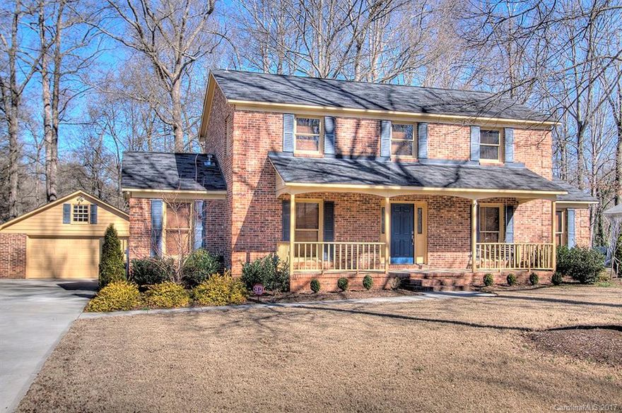 Impeccably maintained 2-story all brick home close to all Charlotte has to offer.  Traditional floorplan including formal dining room with bedroom and full bath on main floor. Updated kitchen with stainless steel appliances and Corian countertops. Spacious master with updated baths and walk-in closet.  Enjoy entertaining on massive screened in porch with vaulted ceilings.  Large two car garage with work area for hobbies.  Beautiful, large backyard with natural area. Make an appointment today!