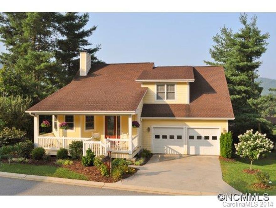 Charming Arts and Crafts Style Home. 1.5 story. Beautiful year-round views from partially covered back deck. Covered front porch. Master on main with jet tub and tile shower. Open floor plan. Vaulted ceiling. Ceiling fans in great room and bedrooms. Alarm system. Hardwood floors lower level. Fireplace. Storage under house and above garage. GREAT LOCATION, convenient to downtown and shopping. Lovely neighborhood.