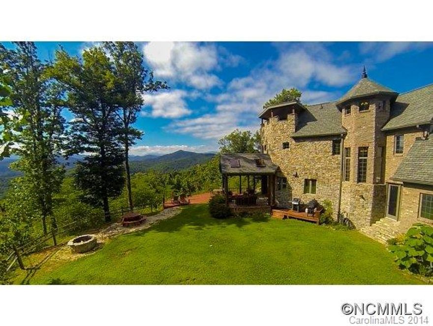 Chateau de Vue - when the ordinary won't do. Yesterday's grandeur today in this distinctive custom home with its own turret to enjoy those commanding long range views. Original and creative custom work in every room. Each bedroom suite is unique.  All the luxury features you expect in a private setting yet close to all that Asheville offers.  See feature sheet for specifications and floorplans.  Gracious without being ostentatious.