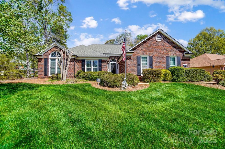What curb appeal in this lovely brick ranch in the popular Lake Park neighborhood!  There are spacious rooms, tall, vaulted ceilings, and abundant windows for great natural lighting. This home has a smart floor plan with a large living room and large den/family room. The kitchen & breakfast is spacious and open to the dining room and sunroom/office.  Bedrooms and full baths are located on the opposite side of the home for added privacy.  The rear yard has a welcoming patio accessed from the den/family room and the sunroom/office.  Storage shed/workshop in the rear yard.  2-car attached garage.  Fantastic neighborhood amenities include clubhouse, pool, fitness center, playground, ponds, tennis, pickleball & basketball courts, dog park, picnic area, sidewalks & streetlights; some of these amenities require a paid membership.  There are community events throughout the year, and popular shopping & dining are just minutes away.