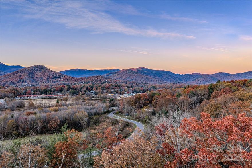 Spanning nearly 150 acres, this site offers an unprecedented development opportunity within Asheville’s continued expansion to the east. This legacy site represents one of the largest available land assemblages with interstate frontage in Western North Carolina. The property is positioned along I-40 with direct access to the planned and fully funded Blue Ridge Road interchange (NCDOT Project #I-4409). Located within a corridor identified for significant infrastructure investment and growth, the site will benefit from enhanced regional access and visibility. All utilities are available, and permitted uses support a wide range of commercial, residential, and mixed-use possibilities. Situated out of the floodplain, but within the picturesque Swannanoa River Valley, the property features exceptional views of Greybeard Mountain, Craggy Dome, and the Seven Sisters. This large Employment (EMP)-zoned tract offers one of the most flexible and scalable development profiles in Buncombe County. With the new I-40 interchange strengthening its potential for thoughtful, well-integrated development that aligns with the region’s growing economic landscape.