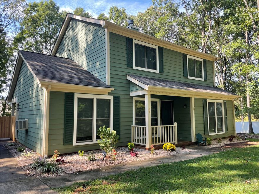 Welcome to this 3-bedroom, 2.5-bath haven, nestled in a lush, tree-lined landscape & cul-de-sac lot. The home radiates charm & comfort, boasting a lovingly white washed fireplace & a stylish new mantle in the living room. Modern vinyl plank flooring graces the bonus room, mudroom, & downstairs bath. The kitchen is a culinary delight, with a sleek Samsung ss range & pristine white basin sink. The 2nd bath is a masterpiece of exquisite tile, a sleek shower insert, fresh vanity, & contemporary lighting. The mudroom offers convenience w/ bench seating. The backyard is cleared, and awaiting your outdoor vision. On the main level, you'll find new banisters, enhanced lighting, & smart controls in the bonus room. An AMAZING flat yard that is over 1/2 acre with both sheds having lights & electricity in them. This character-filled home blends modern comfort with timeless allure.