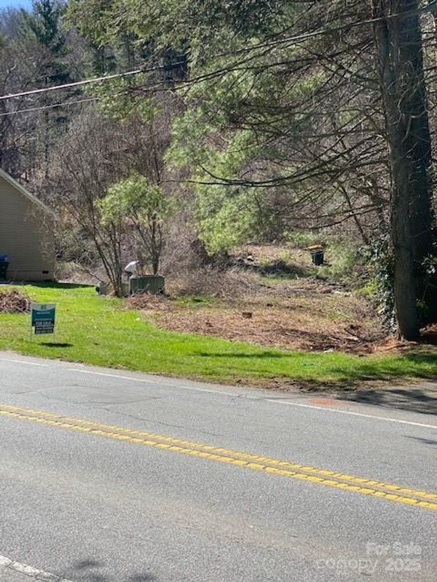Just over 1 acre, less than 1/2 mile east of Sweeten Creek Road! Convenient to everything in South Asheville. Numerous options due to EMP (Employment District) zoning. 30' of Mills Gap frontage.