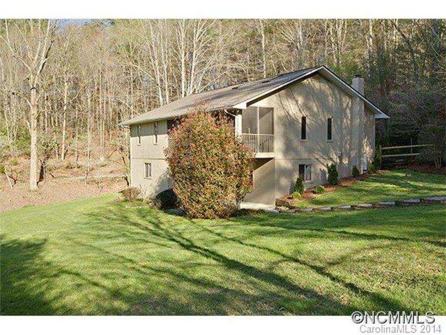 See Virtual Tour!!! Gardener's dream home off pastoral Island Ford Rd. Home boasts mature landscaping, in-law suite, and plenty of natural light. Septic system just recently enlarged by county standards to provide for four bedroom house.