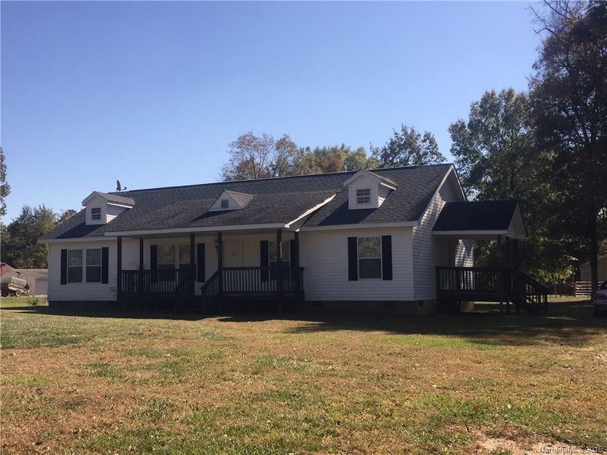 Great home in highly desired Lewisville School District.  4 bedroom, 2 full bath home located on large flat lot.  Great front, back and side porch!