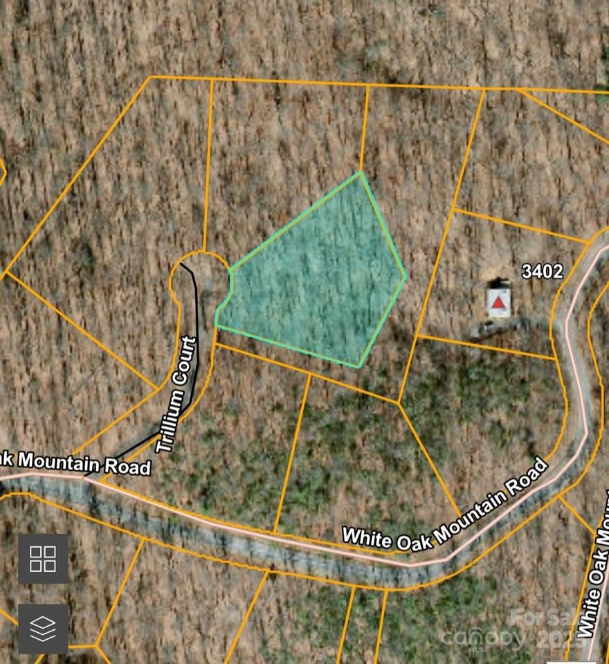Privately located on the backside of White Oak Mountain - this large 1+ acre lot sits on a quiet, private cul-de-sac = Trilium Ct. This lot is one of 5 for sale in a row along White Oak Mountain Rd. And Trilium Ct. - a good opportunity to buy a couple lots around you to insure extra privacy!  White Oak Mountain is located in Columbus, NC and offers a peaceful & quiet location to live, abounding with wildlife, scenic ponds, trails, and more.  White Oak is where Blue Ridge got their beginning back in the 80's, developing log cabins on the mountain. While the Mountain attracts many full time residents, it is still a very popular getaway location today... for 2nd homes & retirees!  The Association offers fishing ponds, picnic areas, a pavilion for residents to use, and walking trails. The association has a very informative website. Restrictions apply - no manufactured homes, HOA Dues, etc.