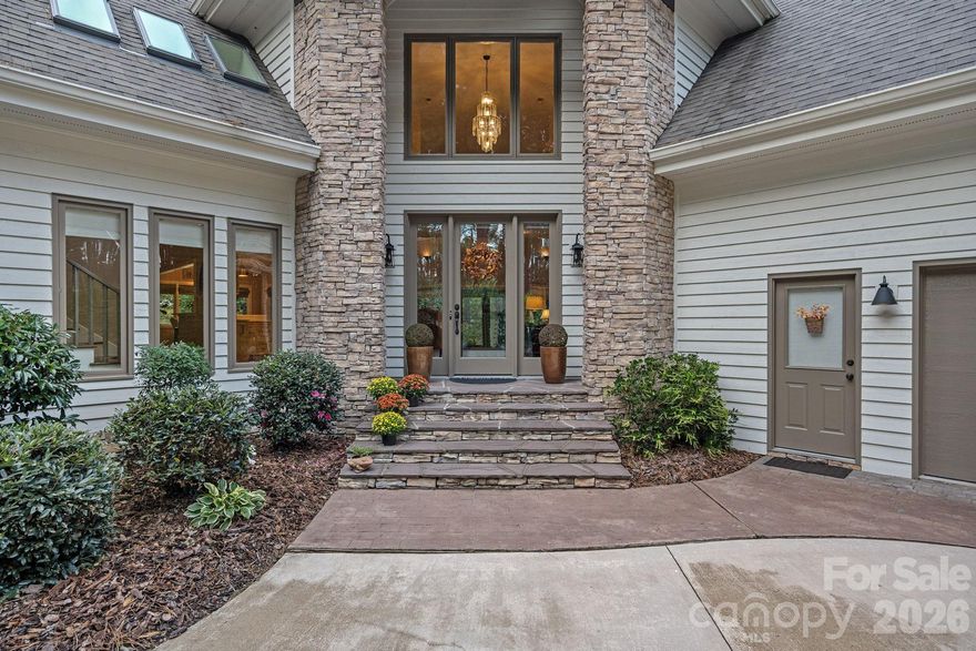 Welcome to this stunning stone and cedar two-story home, perfectly situated on Hole 12 inside the gated community of Uwharrie Point. Surrounded by the breathtaking Uwharrie Mountains and the prestigious Old North State Club — a private Tom Fazio-designed championship golf course that opened in 1992 along the shores of Badin Lake — this property offers an unmatched lifestyle of luxury, leisure, and natural beauty.

Step inside to discover a beautifully updated kitchen and refreshed baths throughout the home. Thoughtful finishes blend timeless charm with modern comfort, creating spaces that are both elegant and inviting.  The second floor offers plenty of room to relax and entertain. You'll find two additional bedrooms, two additional baths, and a huge bonus room complete with a custom bar — the perfect spot for hosting friends and family after a day on the course.

Start your mornings with coffee on the screened-in back porch, where you can take in the peaceful views of the golf course.


A Little About The Community:
Uwharrie Point is a gated community built around the Old North State Club, a Tom Fazio masterpiece recognized as one of North Carolina's premier private golf experiences. Residents enjoy access to championship golf, lakefront amenities on Badin Lake, and the quiet beauty of the Uwharrie Mountains right outside their door.
This is more than a home — it's a lifestyle.