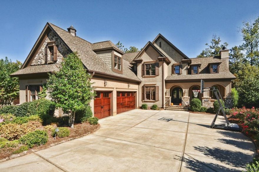 European style home w/finest features &finishes: preengineered reclaimed hardwoods; great room w/vaulted ceiling and stone fireplace & access to covered porch;kitchen- top of the line appliances,copper farm sink,oversized island w/black walnut top,custom hood, Habersham style cabinets,custom lighting;plantation shutters;steam shower&Jacuzzi in master BA;basement w/ 2nd living quarters,bar,billiard room, fitness,rec/media room;2 offices,gorgeous pool,Trex decking,big backyd;Ballantyne schools!