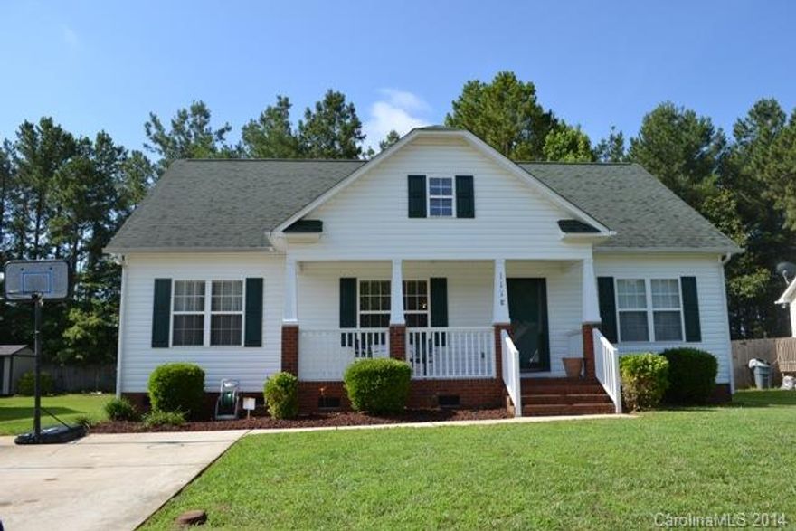 This home is located close to Lake Wylie!  Split bedroom plan with all living on main level except for bonus room!  Spacious kitchen and eating area, two-story great room with fireplace/gas logs.  Rocking chair front porch and deck.  House is located near the end of the cul-de-sac!  A must see! Great location!