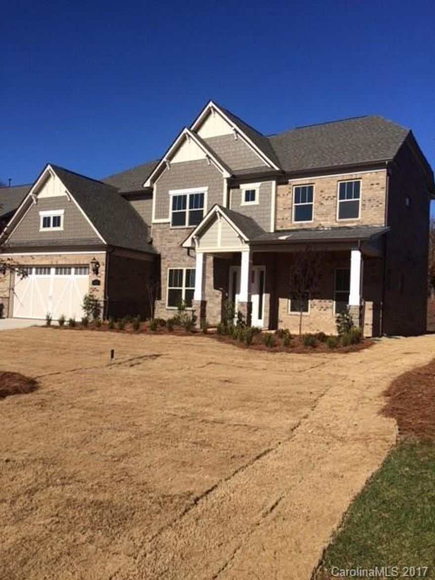 Beautiful home with a grand, two-story foyer.  First floor features an open floor plan with a guest suite & full bath.  Stunning kitchen has custom-feel cabinets with dovetail construction, soft close doors & drawers, pullout shelves.  All stainless appliances including range hood & gas cooktop.  Master suite includes upgraded, spa-like bath & room-sized walk-in closet.  The backyard features a covered lanai and park-like setting.  Close to Ballantyne area, but low Lancaster County, SC taxes.