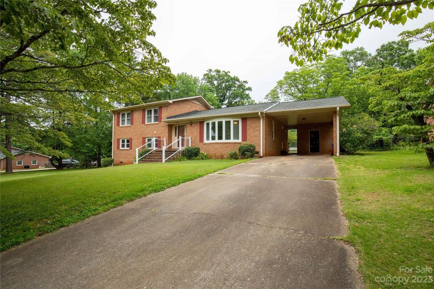 Home sweet home in Winthrop Heights! You will love this established neighborhood and the charming curb appeal of this all-brick home. Lots of opportunities to make this home your Home Sweet Home. The great room has a fireplace, a living room with bay windows, and a spacious kitchen. This home has four large bedrooms with two full bathrooms. The backyard is partially fenced and has lots of space on .34 acres with mature trees and landscaping to the private backyard, this home feels like a retreat from the hustle and bustle of a busy life...although it is within minutes of I-77 and all that is popping up in downtown Rock Hill.