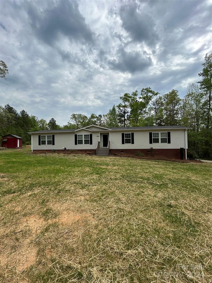 Beautiful home located on 1.75 acres in the Buford school district. This home has been updated with new paint, new granite kitchen countertops, new carpet, new light fixtures and ceiling fans, and comes with stainless steel appliances including refrigerator. House has large open floor plan with large kitchen area that includes island, dining area and large pantry. House has a huge deck on the rear for entertaining, and utility building for storing tools and equipment. Property also has approximately a 20x30 concrete slab and block foundation in place for possible future garage or workshop. Please come and take a look and be ready to call this quiet country living place home. Contract is contingent-you may still show.