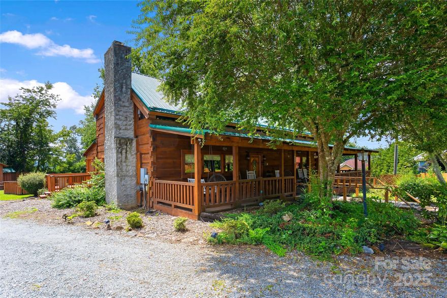 Gorgeous Log Cabin priced under $165/sf! This home is loaded with charm, quality, and unique craftsmanship. Step inside to discover a gorgeous stone fireplace, custom-carved stairwell (that took 6 years to create!), hardwood and carpeted floors, natural slate tile countertops, and slate flooring in the kitchen and baths. There's even a hot tub! New basement insulation, a lifetime metal roof on the main home and all outbuildings, and extensive updates that make this property move-in ready.
Set on a large and private lot, the property includes a separate bunkhouse with two beds, a tool shed, mower shed, insulated one-car garage, a firepit, extensive decking, and a welcoming covered front porch. Every outbuilding matches the quality with durable metal roofing. Even better—all furnishings are included! 
Whether you’re seeking a primary residence, or investment, this home offers rare character, versatility, and lasting value. Don’t wait—schedule your showing today, this one will go fast!