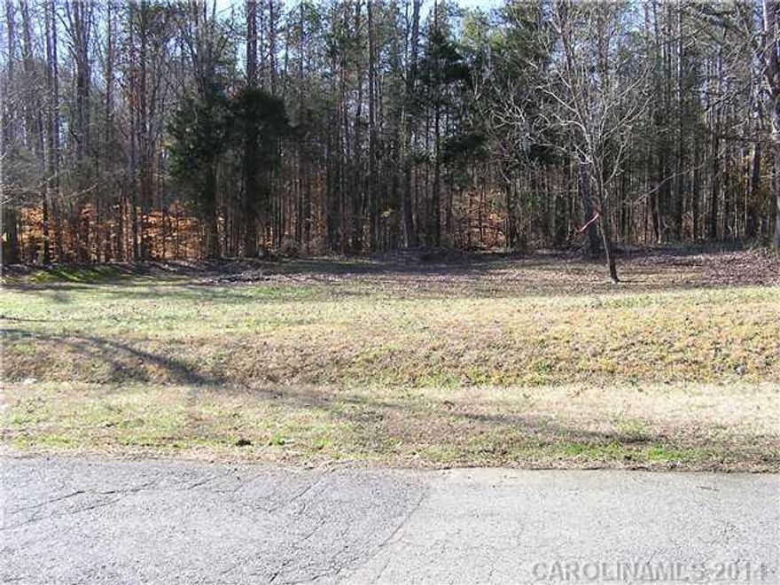 2.88 Acre Building Lot inside Mecklenburg County.  Quiet neighborhood, large homes on large lots with horse farms and rolling farmland all around.  Already perked for a 3 bedroom, septic system.  Dead end streets in this rural neighborhood at the edge of Cabarrus County.  Really nice area to let the kids or pets to have some room to roam and play!