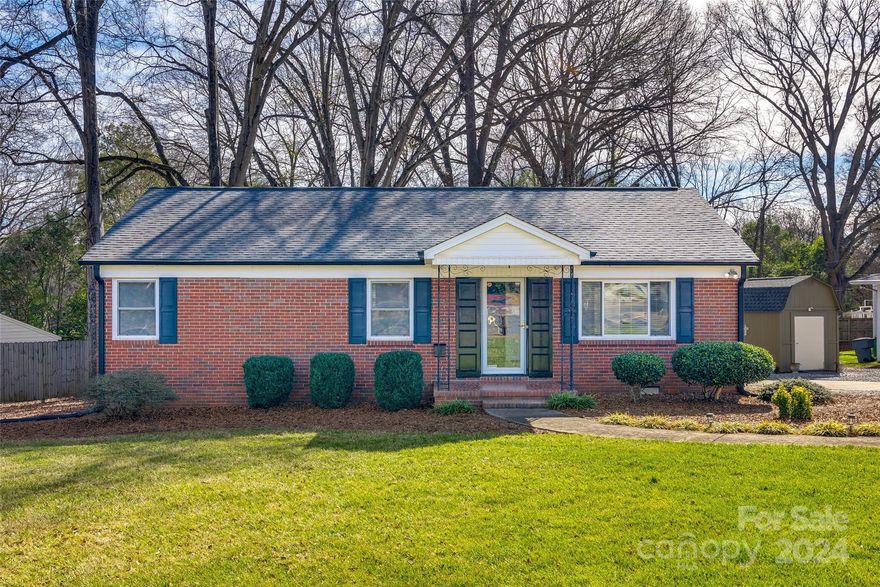 Meticulously maintained full brick ranch in desirable Madison Park neighborhood is waiting for your personal touches. The roof was replaced in November of 2018, HVAC replaced in December 2022, and the water heater in February 2023. Gleaming original hardwood floors throughout the living room, hallway and all 4 bedrooms. Laundry is located in the utility room on the enclosed back porch. Beautiful corner lot with large fenced backyard, additional parking, and a storage shed with new roof in July 2023 for all the extras. Located minutes from Park Rd shopping center, South Park, surrounding restaurants, Uptown Charlotte and more!