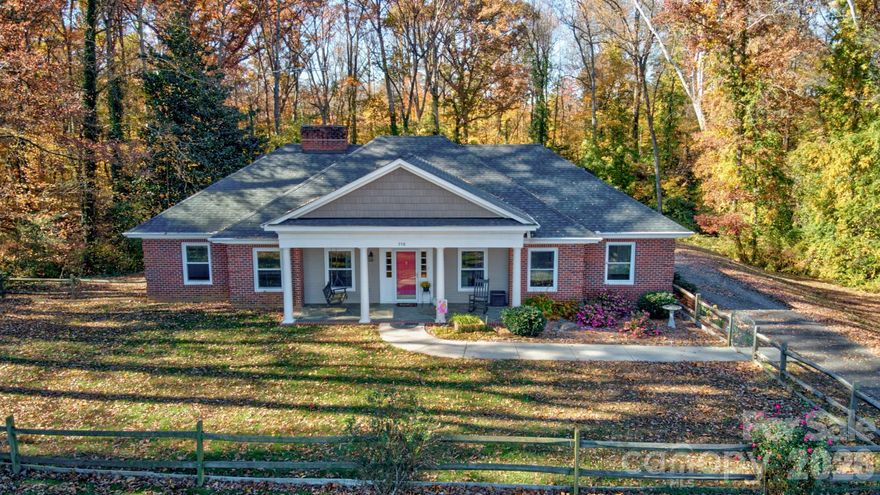 This is the one you’ve been waiting for! With spring in full bloom, your new home is ready to welcome you to a life of comfort and possibility. Nestled in desirable Cool Spring and set on more than three acres of land, this beautifully updated 3-bedroom, 3-bath home offers the perfect blend of character, space, and modern amenities.

Step inside and experience the open, inviting atmosphere created during the 2014 remodel. The spacious kitchen now features custom cabinetry, gleaming granite countertops, and stainless steel appliances, making it a true centerpiece for gathering and entertaining. The kitchen flows seamlessly into a large dining area, perfect for hosting family and friends, while the front living room is already set up for relaxing game nights or cozy movie evenings by the fireplace.

This home strikes a wonderful balance between modern updates and original charm. Unique architectural details abound, from walnut built-ins designed for buffet service to the original Dutch door connecting the kitchen and living room, and an elegant archway leading from the foyer into the living space. The primary bathroom on the main level is finished with a stylish tile shower and custom cabinetry with granite counters, a touch echoed in the second downstairs bath.

Upstairs, the transformation completed in 2022 truly elevates the home. Indulge in the luxurious, spa-inspired bathroom with a deep soaker tub and exposed beams for a rustic yet refined feel. The upstairs window seat offers the best view in the house, overlooking your private backyard, while the spacious upstairs living room is ideal for entertaining guests or hosting weekend visitors.

With over three acres, the possibilities are endless—imagine adding a large outbuilding, creating winding trails, or even subdividing to build or sell. The home is located in the sought-after Cool Spring Elementary district, offering peace of mind and a sense of community.

Additional highlights include a fully encapsulated crawlspace (2025) with a one-year warranty and all modifications properly permitted by Iredell County. Don’t miss the chance to experience this unique home—let’s schedule your tour today! Listing agent is owner.