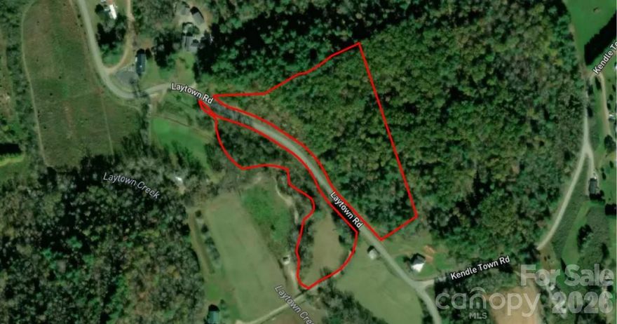 Own 9.01 acres of beautiful wooded land in Lenoir, NC, offering privacy, fresh mountain air, and endless potential for your dream home or weekend retreat. Surrounded by the natural beauty of the Blue Ridge Mountains, this property puts you minutes from outdoor adventures at Wilson Creek, Pisgah National Forest, and the charming shops and restaurants of downtown Lenoir. Enjoy a peaceful setting while still being conveniently located about an hour from Charlotte and just a short drive to Hickory and Boone. With space to roam and room to build, this acreage offers the perfect balance of seclusion and accessibility. Priced below market value, this is hands down the best deal on the market—don’t miss your chance to make it yours.