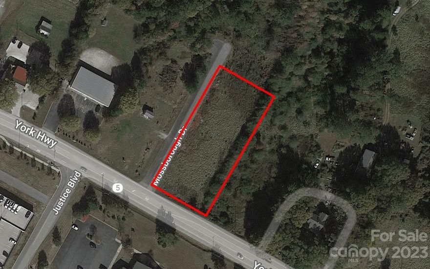 Prime commercial land with 150+/- feet of road frontage in York, directly across from the Moss Justice Center. You can build your dream business, current zoning allows for office buildings, restaurants, and other small scale businesses. An additional 7.7 acres are connected to the lot and available for sale if you need additional land. County Taxes.