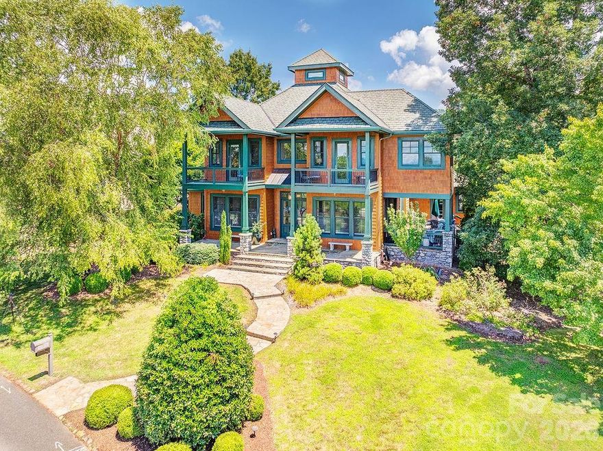 Introducing a residence of exceptional quality, where elegance meets superior craftsmanship. This custom-built home offers 5 bedrooms and 4.5 baths, thoughtfully designed around a highly functional floor plan. The main level features a grand living room and a formal dining room, ideal for both everyday living and entertaining. The gourmet kitchen is a chef’s delight, appointed with premium appliances, dual ovens, a warming drawer, and beautifully crafted custom cabinetry. The primary suite serves as a serene private retreat, complete with a gas fireplace, sitting area, spa-inspired bath with steam shower and whirlpool tub, an expansive walk-in closet, a sunroom, and direct access to the patio. Additional luxury touches include heated floors, remote-controlled blinds, a custom wine cellar, wet bars on both levels, and discreet built-ins—such as a hidden television cabinet in the living room. Enjoy breathtaking mountain views, professionally designed landscaping, a fenced yard, and a spacious 3 car garage with built in storage. Nestled in the picturesque Reems Creek Valley, this home offers the perfect blend of tranquility and convenience—just 5 minutes to downtown Weaverville and 15 minutes to Asheville.