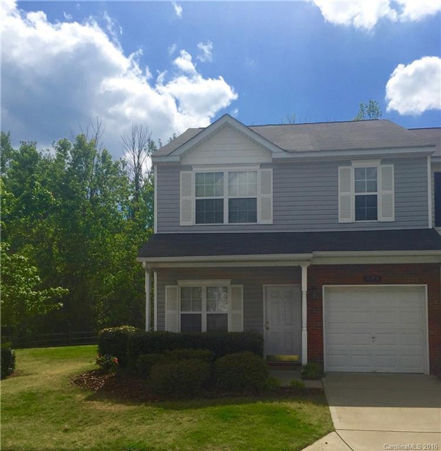 This beautiful end unit Town Home is in the award-winning Fort Mill School District!  Backs up to gorgeous wooded area, green space and patio that is perfect for entertaining and grilling out.  Kitchen and breakfast area that opens up to a large great room that has a gas fireplace.  Master bedroom has a nice sitting area and a large walk-in closet. The loft area offers extra space for rec/play, media area.  Close to 77 and 485 freeway.