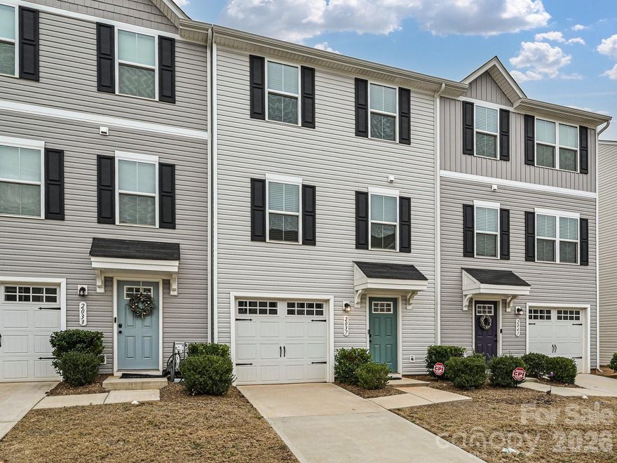 This lovely townhome is near it all. Located just minutes from uptown Charlotte, interstate, & the airport. The main living area features an open concept with nice kitchen w/ beautiful granite countertops, stainless steel appliances(including the refrigerator), nice size dining space, and open family room(ideal for entertaining) w/ half bath tucked away in the corner. Upstairs has 3 bedrooms, 2 full baths plus the laundry area. The lower level has a 1 car garage, a large storage closet, and a flex space that could be used for an office space, gym, or play area. Both the main & upper level have LVP flooring.