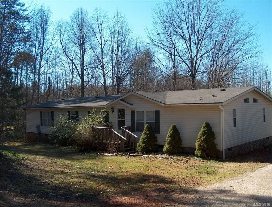 1998 Fleetwood build, on 3 acres of land, 3 bed, 3 full bath, huge master with shower and garden tub, walk through closet in master, large living room with fireplace, connecting to an open kitchen with island, 12 x 23 workshop 110 wired , creek borders side of property, multi level deck in rear, fish pond with pump in front, two other out buildings, one constructed of logs, but both of these need repair, and are located further back on property, new roof 2015, HVAC replaced also.