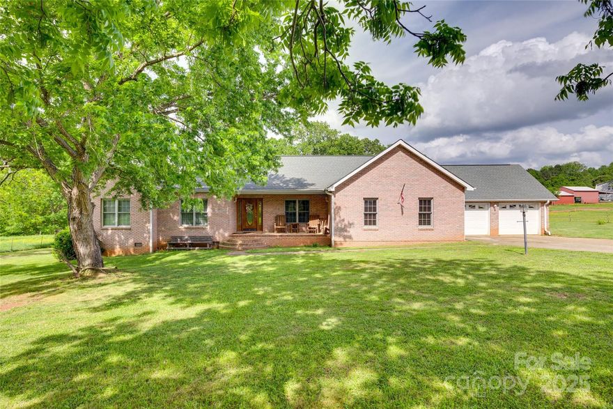 Escape the hustle of the city and enjoy peaceful country living—without feeling remote. This beautifully updated ranch on 3.6 private acres offers it all! Step into the spacious great room, where vaulted ceilings and a wood-burning fireplace create a warm, inviting feel. The kitchen is a standout, featuring stainless steel appliances and leathered granite countertops that blend elegance with everyday function. The primary suite includes a luxury walk-in tub for the ultimate in comfort and accessibility. Throughout, enjoy refinished hardwood floors, fresh paint, a brand-new HVAC system, and two new decks perfect for relaxing or entertaining. A huge bonus room offers endless flexibility—ideal for a media room, gym, or home office. Outside, you’ll find a wired barn with an open covered area, an oversized two-car garage, and a new above-ground pool ready for summer fun. This home gives you the space and serenity you’ve been dreaming of, while still keeping you close to everything you need.