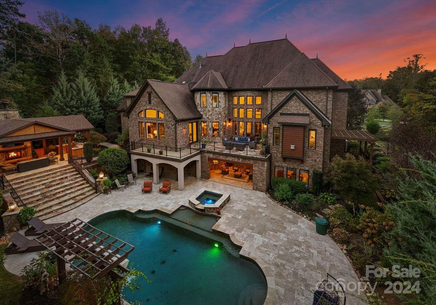 Pinnacle of luxury living! Resort feel, nestled in a prestigious gated community.This stunning estate offers privacy, lifestyle, award winning schools & easy access to high end shopping & dining. Exquisite custom features throughout. Extraordinary ceilings & architectural details. Main level primary suite with recently updated custom closets. Entertain in tranquil outdoor living areas with a feel of being in the mountains! Large salt water pool & magnificent cabana. Lower level includes entertainer's bar, gym, sauna, theatre, wine room & billiards room. Additional full bedroom & bath gives ultimate privacy. 4 additional bedroom suites upstairs and separate nanny/guest quarters off the detached garage. Septic permit is for 5 bedrooms, but there are 7. Laundry on every level. High end kitchen & primary bathroom ready for your updates. Priced to sell! Gorgeous curb appeal w circular driveway. Very special setting on almost 2 acres.  See agent remarks for additional features!