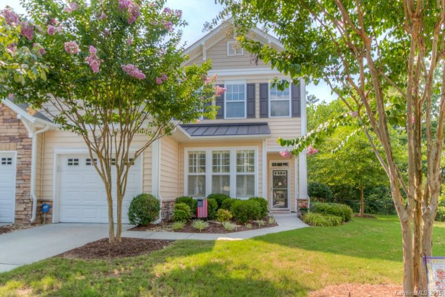 Beautifully maintained End Unit townhome in Calloway Village on Tega Cay Peninsula. Private covered patio PLUS extended stone patio overlooks woods. Seasonal Golf Course view. Tons of upgrades and custom details - granite counters, stainless steel appliances, plantation shutters, custom ClosetMaid system, upgraded carpet. Convenient first floor master suite and laundry. Easy Living! Exterior maintenance managed by HOA. Enjoy the vacation lifestyle of Tega Cay with the proximity to Charlotte.