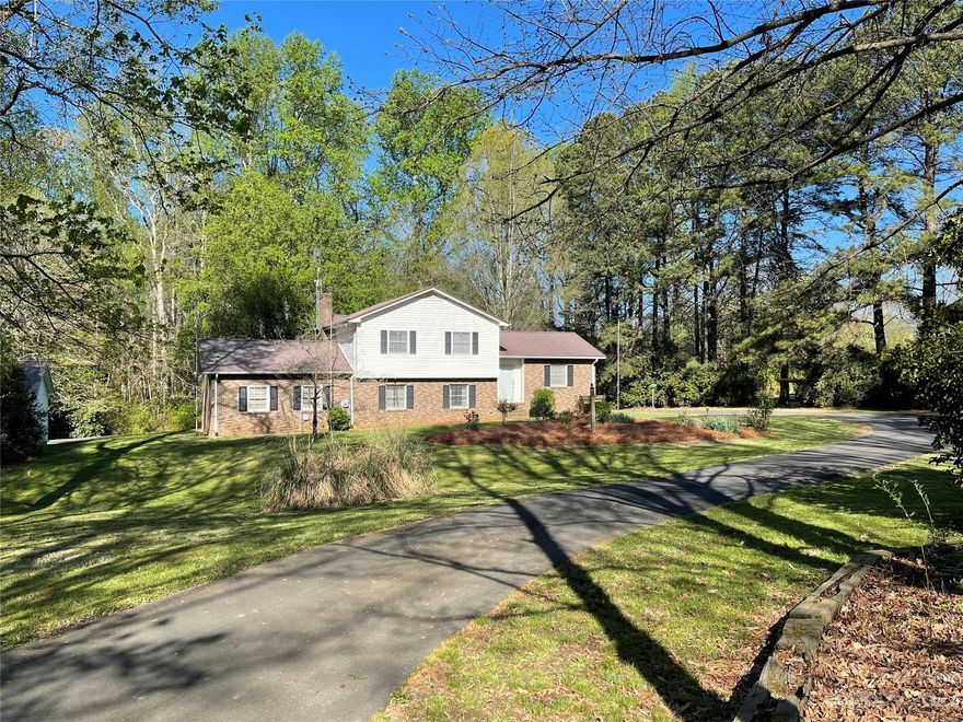 Located in the heart of Rockwell this 3 bed 2.5 bath home sits on 3.44 private acres. Beautifully landscaped and well maintained both inside & out, this property has so much to offer! Two car attached garage and 3 detached buildings with power provide plenty of room for storage. The patio and deck are perfect for outdoor entertaining. A flex space in the house could be used as a dining room, office or den. Huge laundry room that includes a half bath, gas logs fireplace in the living room, eat in kitchen, great sized closets and a balcony off the primary bedroom. All appliances stay, including washer and dryer. This is truly a great property with endless possibilities! Let's make this house your home!