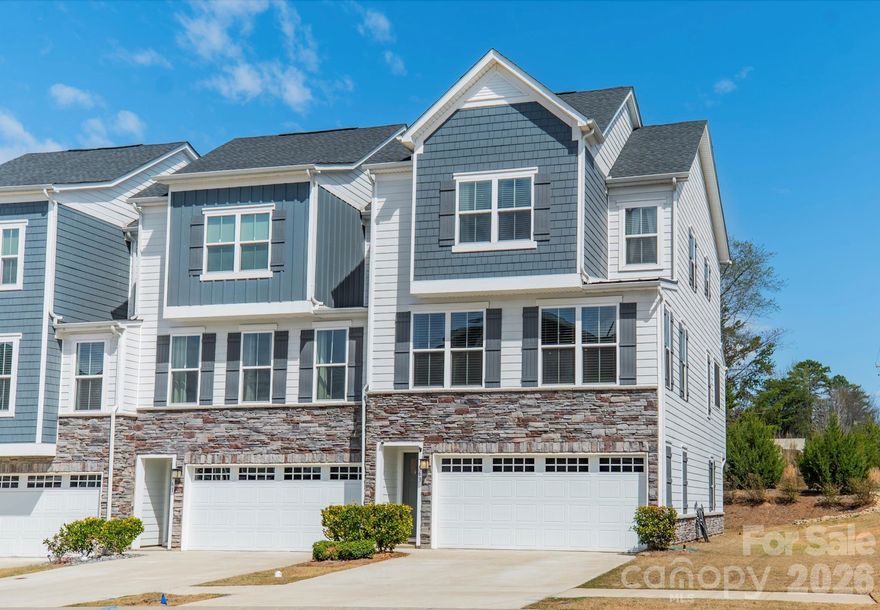 Beautifully designed three-story end-unit townhome in the popular Trinity Townes community of Tega Cay! This home features a full guest suite on the entry level, perfect for visiting family or a private home office. Upstairs, find a stunning kitchen complete with quartz countertops and white cabinetry, an open dining area, a large family room surrounded by windows, and a newly screened-in porch with a gas fireplace! Upstairs, discover the primary suite with double vanities and a walk-in closet, along with two additional bedrooms and a full bath. Enjoy the upgraded advantages of an end unit, including bright natural light from added windows, and the peaceful screened porch and walk-out green space. Home also features a two-car garage. This is the one you’ve been waiting for!