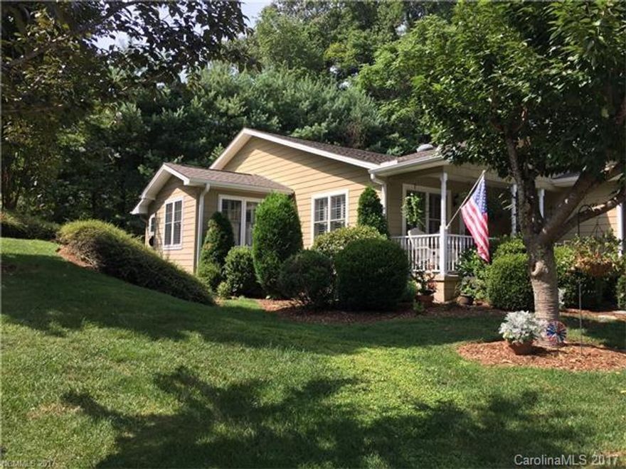 Adorable home in Spring Village.  Impeccably maintained with upgraded flooring, counters, baths, lighting. Spacious bedrooms, large baths, nice kitchen space with natural gas range. Plantation shutters throughout the home, gas fireplace in LR., bonus sunroom, large dining room for entertaining. One car garage with storage shelves. So convenient, great walking area.  Relax on the covered front porch on your private corner lot. HOA only $100 per month. Cute! Cute!