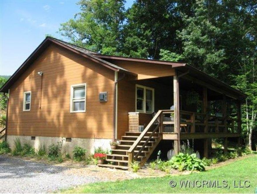 Fabulous cabin on the hill which has been lovingly maintained and improved. Hardwood floors in great rm,carpet, tile and slate on other floors. Gas stove, newer appliances, nice landscaping with fenced in area for pets. Perfect for first time buyer, those looking for a summer home or who just want to downsize. Sit on the pretty front proch swing and enjoy the mountain breeze and views.JUST REDUCED PRICE FOR QUICK SALE! CALL NOW!