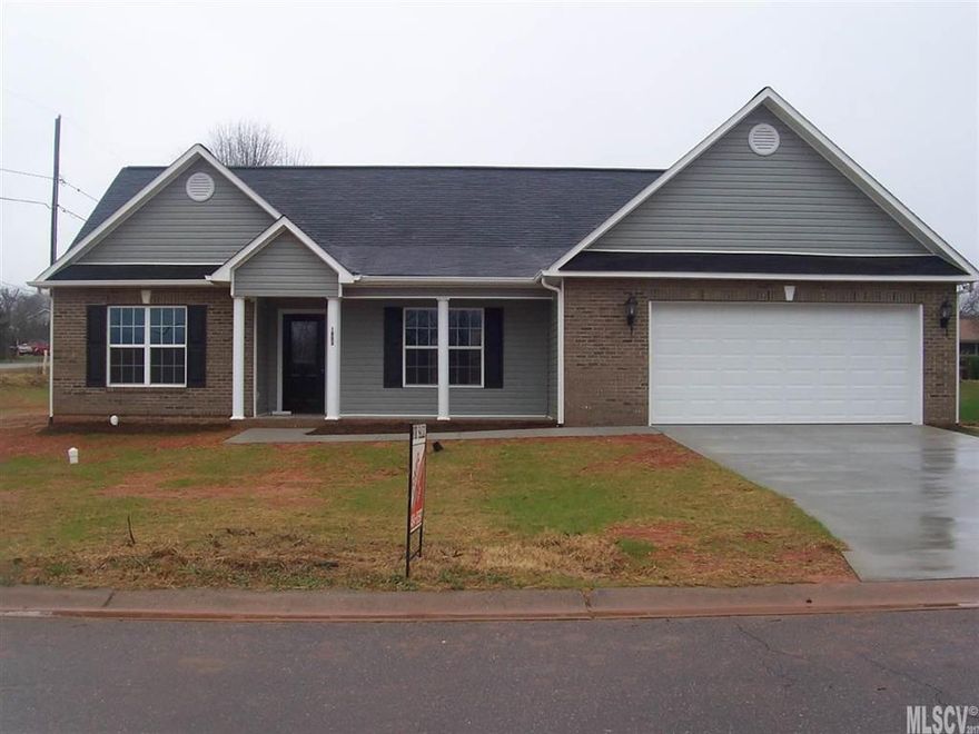 Beautiful New Brick and Vinyl Ranch home on Corner Level Lot in City of Conover! Laminate Hardwood Floors in all Main Living Areas including Great Room, Kitchen, Dining Room and Hallways.  Hard Tile in Baths and Laundry Room.  Vaulted Great Room w/ Gas Log Fireplace. Large Kitchen w/ an abundant amount of Cabinets.  Under Counter Lighting in Kitchen.  Cultured Marble Tops on Bath Cabinets.  Master Bath has separate 4' Shower and Whirlpool Tub.  Trim includes gorgeous Crown Mould and Chair Rail.  Separate Laundry Room.  Large Front Covered Porch.  12' x 12' Concrete Patio behind Home.