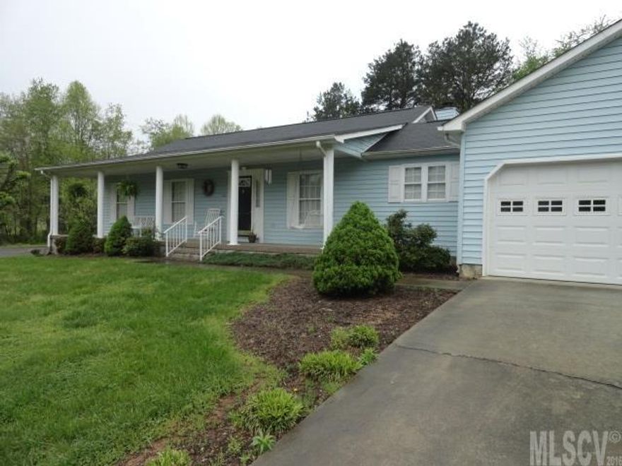 Lovely Home!! Curb appeal is great.   Ready to move in. Neutral colors. Nice spacious living room with fireplace and built in shelves. Dining room with hardwood floors. Kitchen is very spacious as well with almost new vinyl. Updated baths. Master has walk-in closets and is a very good sized room. The 2nd bedroom has a walk-in closet as well. Both bedrooms are spacious. Nice rocking chair front porch. Nice poured patio in back. Very little maintenance needed. Roof only 2-3 years old. Water heater replaced 2 yrs ago.  Priced to sell!!! More than $11000 under tax value.