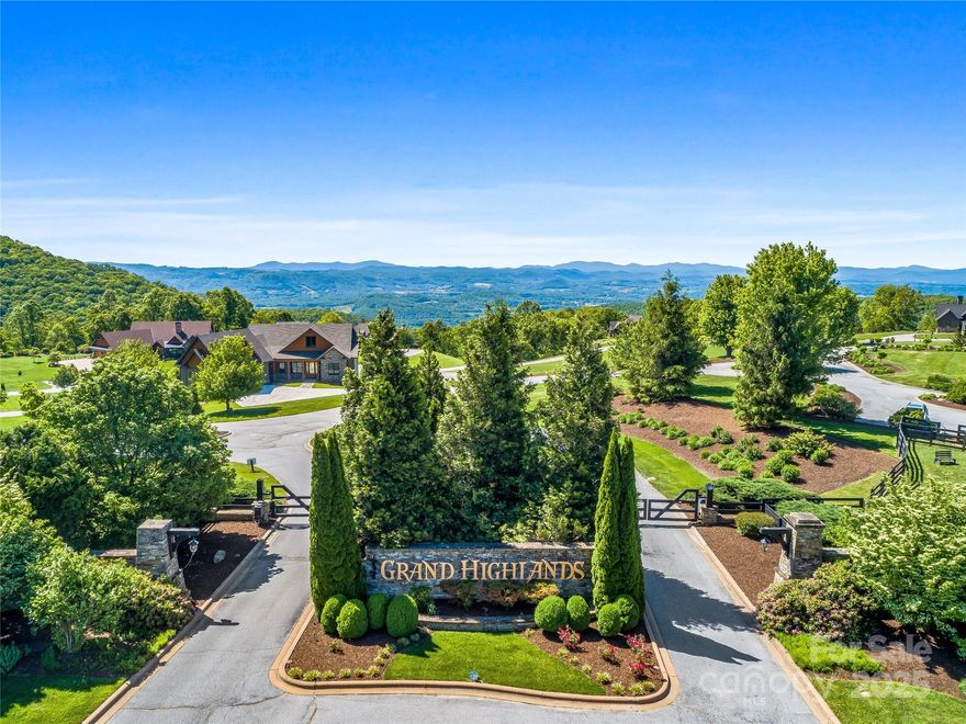 Perched on the highest ridge in Grand Highlands at Bearwallow Mountain, this premier almost 2 acre homesite offers panoramic, year-round views, from the rolling meadows and S.C. foothills to Mt. Mitchell and Mt. Pisgah. A gentle, south-facing building envelope is framed by mature hardwoods, ideal for maximizing light and scenery. Enjoy top-tier amenities including a clubhouse, fitness center, garden, hiking trails, and dog park. Just 30–40 minutes from Asheville and Hendersonville, and steps from Carolina Mountain Land Conservancy trails. This is the highest elevated homesite in Grand Highlands—a rare opportunity for true mountain-top living.