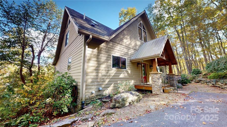 Custom-built mountain home located in the desirable Mountain Glen Golf Course community! This beautiful property features a post and beam design with tongue-and-groove ceilings and an open floor plan that perfectly blends mountain character with modern comfort. The main level offers a spacious primary suite with an en suite bathroom featuring double sinks, jetted tub, separate shower, and convenient washer and dryer. There’s also a second bedroom and full bath on the main floor. The chef’s kitchen includes a granite island, farmhouse apron sink, stainless steel appliances, and built-in wine cooler. Glass French doors fill the home with natural light and open to expansive decks—great for entertaining or relaxing. Upstairs features a cozy loft area and full bath, while the finished basement provides a large family room, gaming area, additional bedroom, full bath, and abundant storage space. Outside, you’ll find a detached one-car garage and a perfect spot to park your golf cart for easy access to the course. This home offers the ideal blend of craftsmanship, functionality, and mountain living in one of Newland’s most sought-after golf communities! Seller is offering seller financing with 20% down payment.