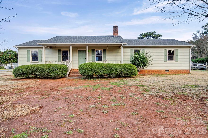 Absolutely a must-see! This charming, updated 4-bedroom, 2-bath ranch offers the perfect blend of comfort and style. Freshly painted throughout, the home feels bright, clean, and move-in ready. The tastefully renovated kitchen features crisp white cabinets, gorgeous granite countertops, a classic subway tile backsplash. Spacious living room, abundant in natural light, showcases cathedral ceiling with exposed wood beams and a stunning brick fireplace, adding warmth and character to the heart of the home. Bedrooms are finished with new plush carpet for added comfort.

Situated on a generous .55-acre lot, this property offers exceptional outdoor living. Enjoy the large back deck for entertaining or unwind on the welcoming covered front porch. The fully fenced backyard provides plenty of room for pets or play. A workshop shed and additional storage sheds offer ample space for tools, hobbies, and extra storage.

Move-in ready. Welcome home!
