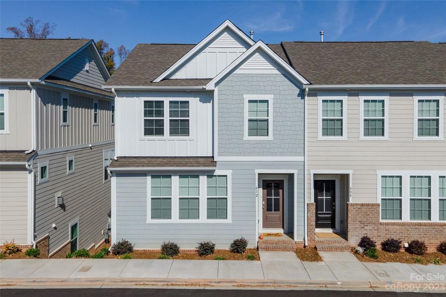 Like new townhome with access to Lake Davidson!  This end unit has space for all your needs with 4 bedrooms and 3.5 Baths, 2 car garage rear facing, and modern open interior.  Luxury Kitchen with quartz countertops, white shaker cabinets, over-sized island, stainless steel appliances, perfect for entertaining.  Main level has 9' ceilings, hardwood stairs, fireplace w/luxury built in cabinets, wide plank luxury vinyl plank flooring throughout.  Primary suite has private walk-out balcony, spacious and bright, walk in closet, trey ceilings.  Luxury primary bathroom. Ground level guest suite with full bathroom! Covered porch on main level.  Davidson living at its finest.  Within Walking Distance to Shopping, Dining, and Outdoor Recreational Activities.