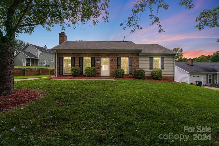 Imagine coming home to tranquil, convenient, charming ranch, perfectly nestled on a serene cul-de-sac street. Enjoy peace of suburban living without burden of city taxes, while being just a stone's throw away from the vibrant communities of Matthews & Mint Hill. 
Step inside to fresh, inviting space with new carpet in the bedrooms, ensuring a cozy retreat at the end of your day. The recently installed LVT flooring throughout the main areas provides a stylish and durable foundation for your everyday living. Picture yourself relaxing in the spacious great room, where a beautiful brick fireplace (sold as-is with no known issues) adds warmth & character to your home.
This delightful home freshly painted & ready for you to move in and make it your own. Plus, there's an incredible opportunity to access special grant money from Bank of America—be sure to ask your agent for more details!
 Experience the perfect blend of comfort, style,& convenience. Your dream home awaits!