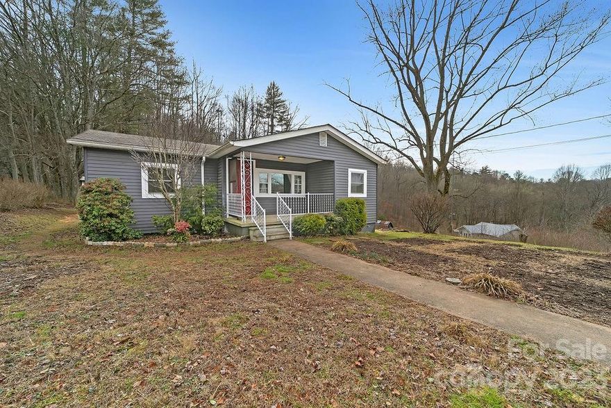 Great home or investment property located 4 miles from downtown Brevard. This updated 3 bedroom 1 bath home has a fenced in back yard perfect for kids or animals. There are several out buildings offering ample room for storage. Inside you will find newly updated floors, fresh tile and paint. The kitchen cabinets and counter tops were also recently updated. If you are looking for a move in ready home at a price that won't break the bank look no further. Situated on .86 acres there is plenty of room for animals, your garden or future expansion.